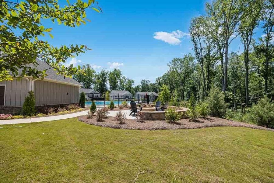 Front exterior of a new home in Kennison Creek, Cumming, GA, highlighting curb appeal (Image 2).