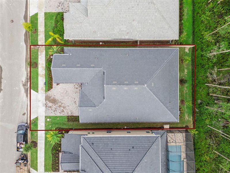 Exterior details and patio area of a home in Palms at Windermere, Windermere (Image 32).