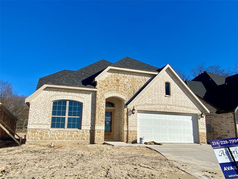 Elegant stone & brick elevation backing to tress. Estmated completion in February.