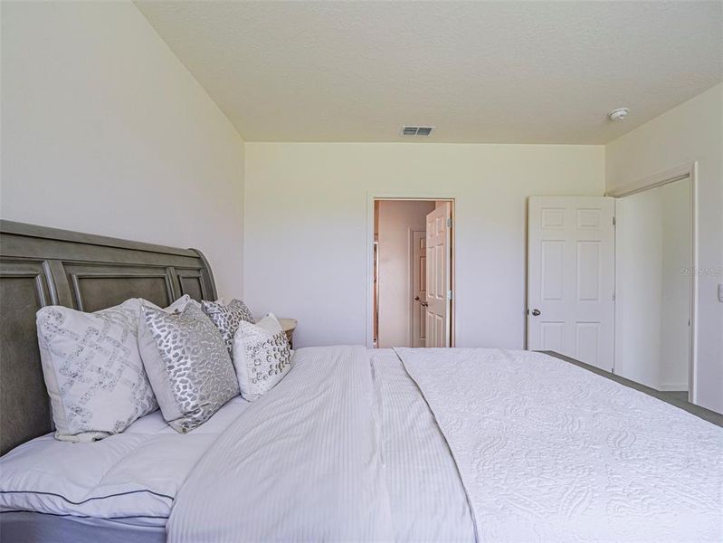 Primary bedroom with access to primary private bath. Primary bedroom with access to primary private bath.