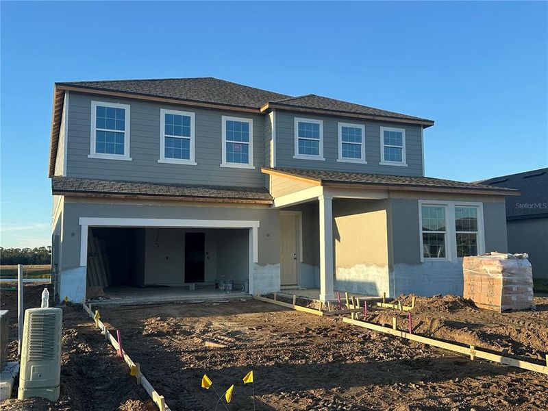 In-progress construction of a new home in Oakfield Trails Traditional, Parrish, FL (Image 20).