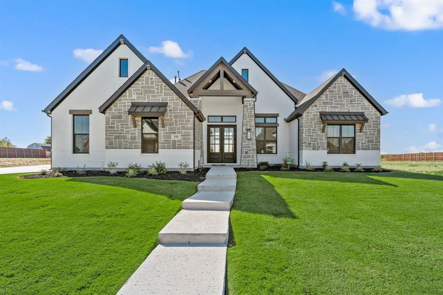 Front exterior of a new home in NorthGlen, Haslet, TX, highlighting curb appeal (Image 23). Front exterior of a new home in NorthGlen, Haslet, TX, highlighting curb appeal (Image 23).