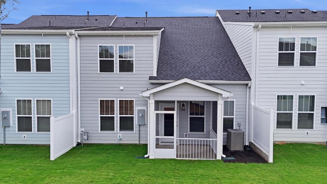 Superior curb appeal continues to the back with a refined, covered screened-in porch by DRB Homes