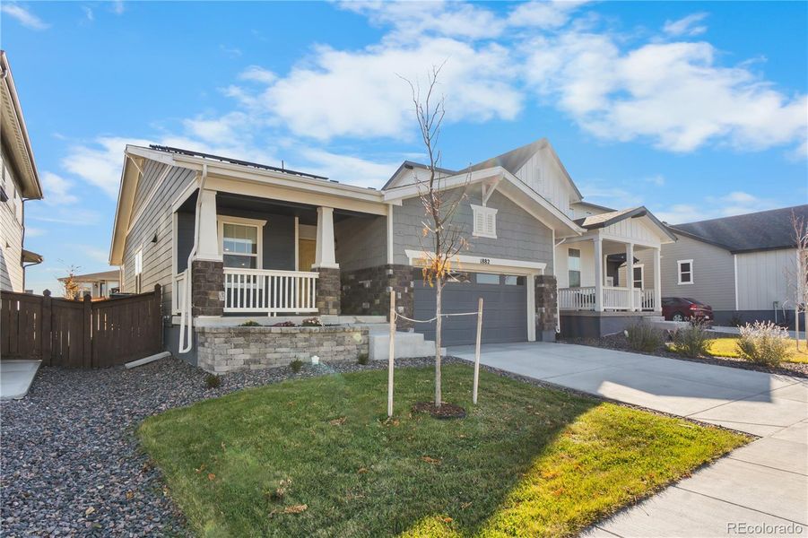 Front exterior of a new home in , Brighton, CO, highlighting curb appeal (Image 23).