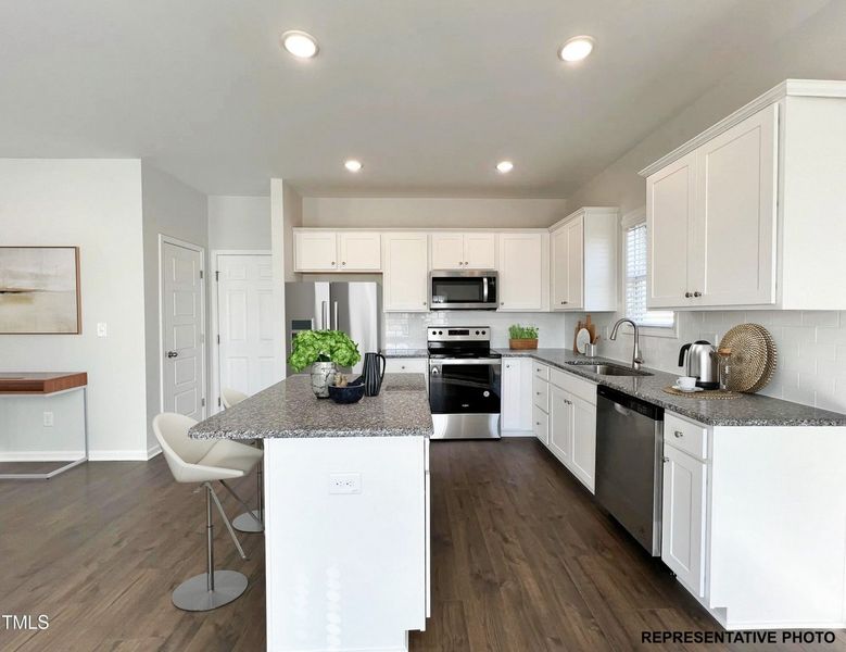 Representative furnished interior of a home built from the Palmer by RiverWILD Homes in Riverwood Ranch, Clayton (Image 9).