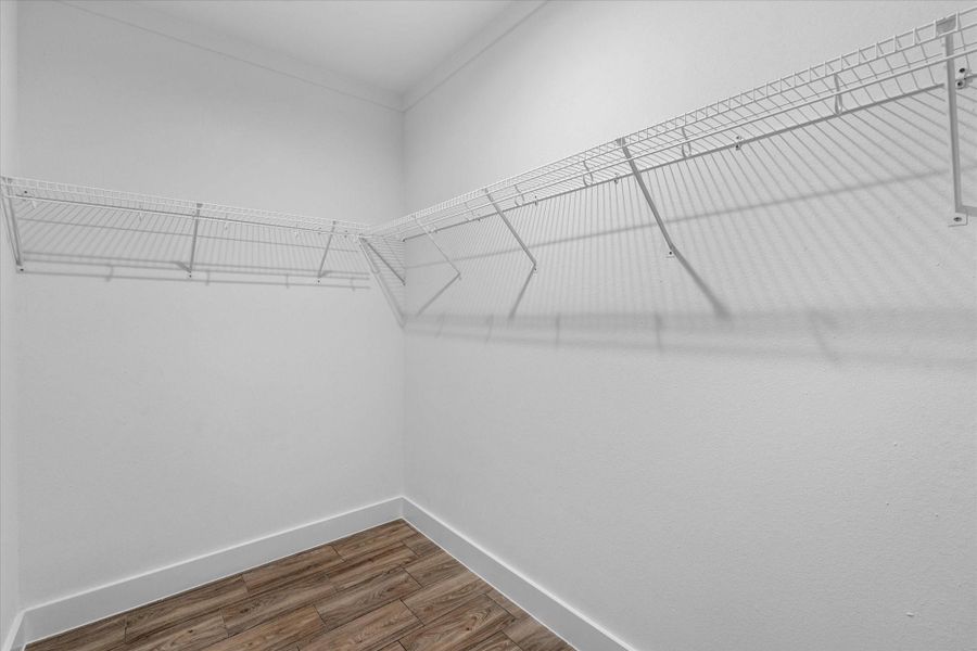 Primary walk in closet Primary walk in closet