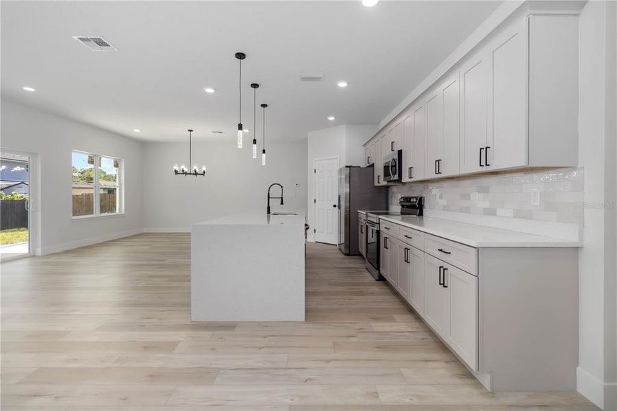 Furnished interior view inside a new home in , Palm Bay (Image 7). Furnished interior view inside a new home in , Palm Bay (Image 7).