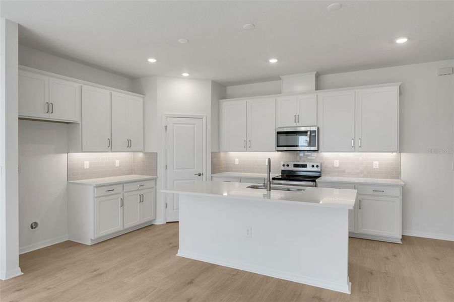 Furnished interior view inside a new home in Seaire, Parrish (Image 15).