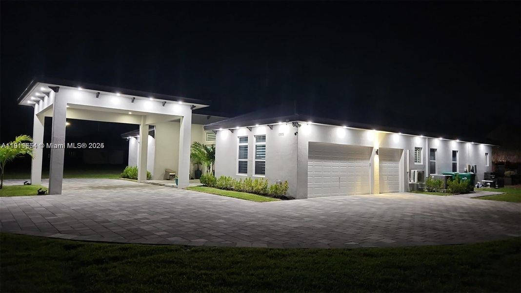 Front exterior of a new home in , Homestead, FL, highlighting curb appeal (Image 1).