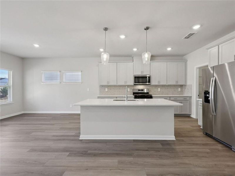 Furnished interior view inside a new home in Martin Springs - Estate Series, Lawrenceville (Image 5).