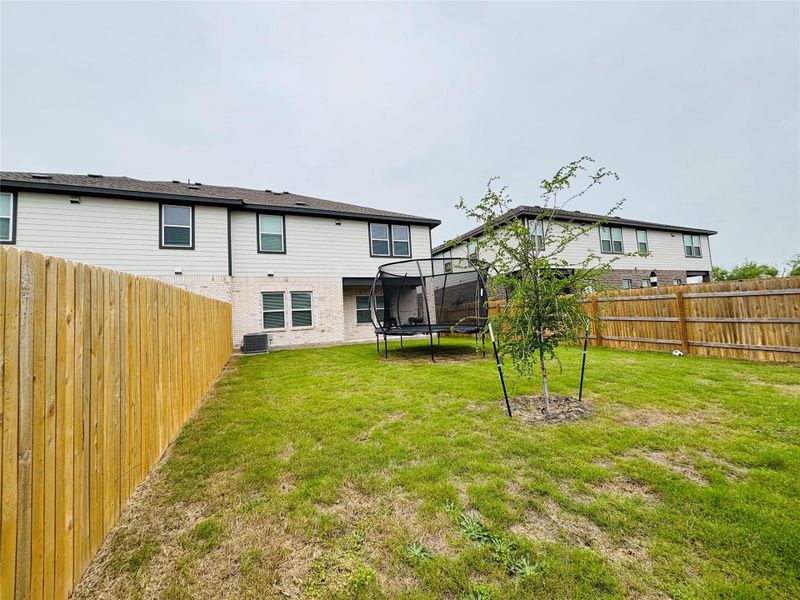 HUGE backyard, covered patio and wood privacy fence. HUGE backyard, covered patio and wood privacy fence.