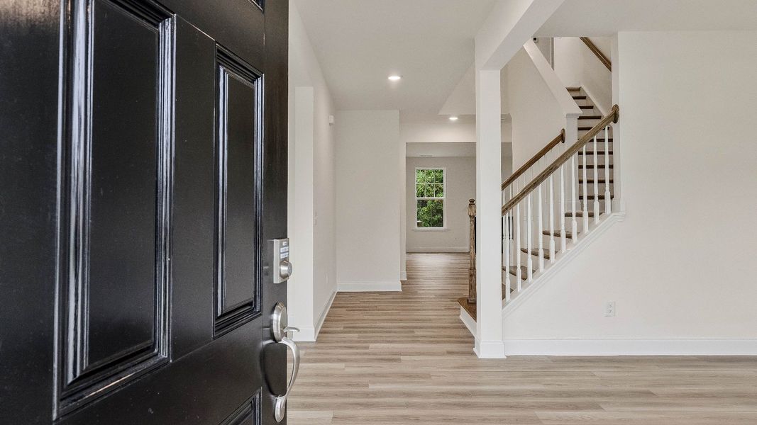 Stonehaven home plan entryway and staircase Stonehaven home plan entryway and staircase