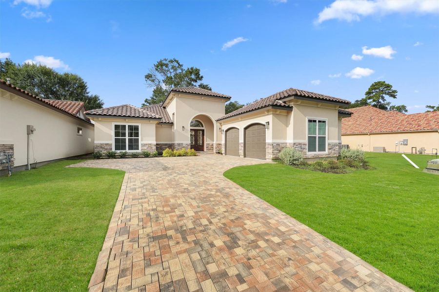 Front exterior of a new home in , Houston, TX, highlighting curb appeal (Image 1).