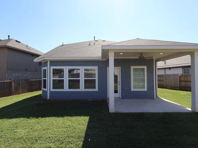 Exterior details and patio area of a home in Moran Ranch, Willis (Image 17). Exterior details and patio area of a home in Moran Ranch, Willis (Image 17).