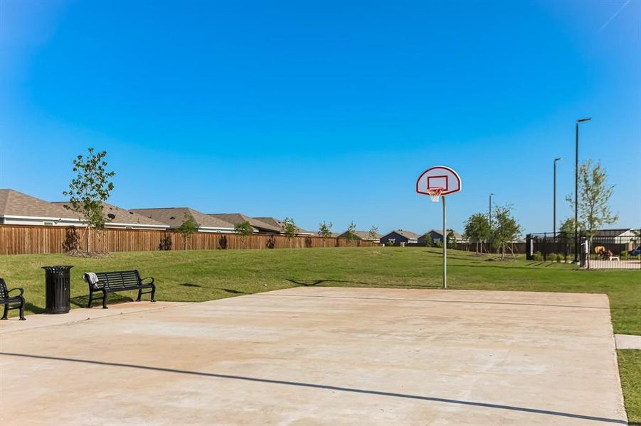 View of patio with basketball hoop