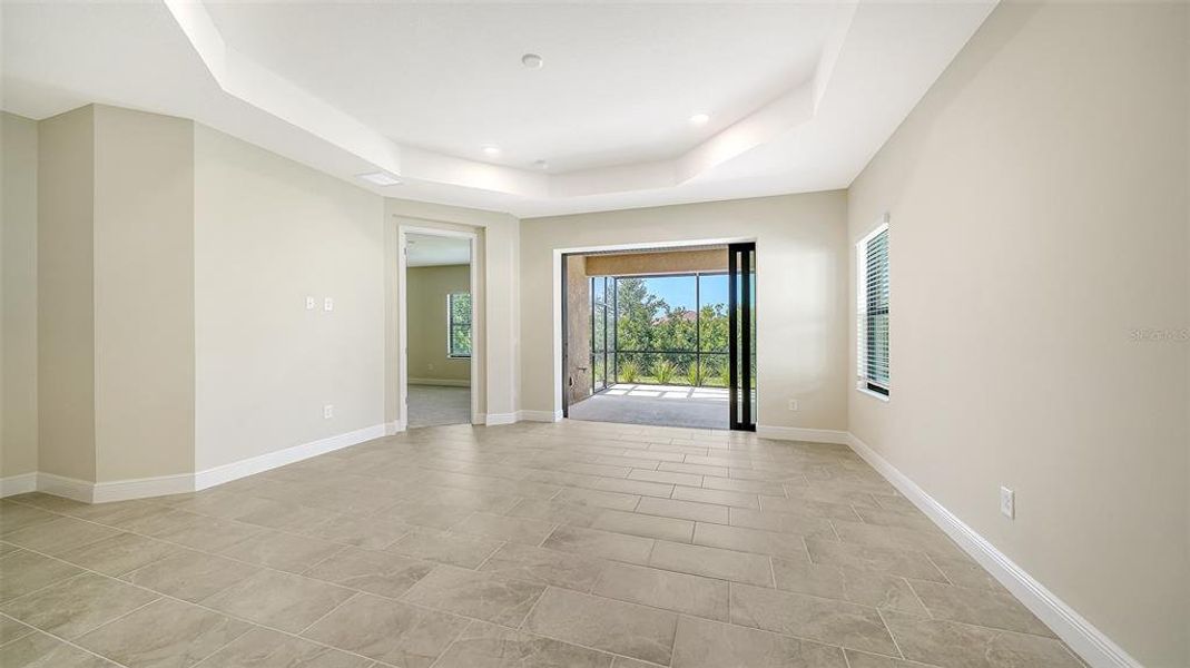 Spacious, unfurnished interior of a new home in Vicenza Real Estate and Homes for Sale in North Venice, FL - Neal Communities, Nokomis (Image 14).