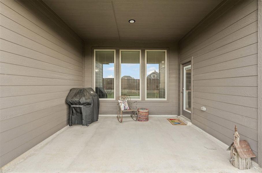 Exterior details and patio area of a home in , Godley (Image 26).