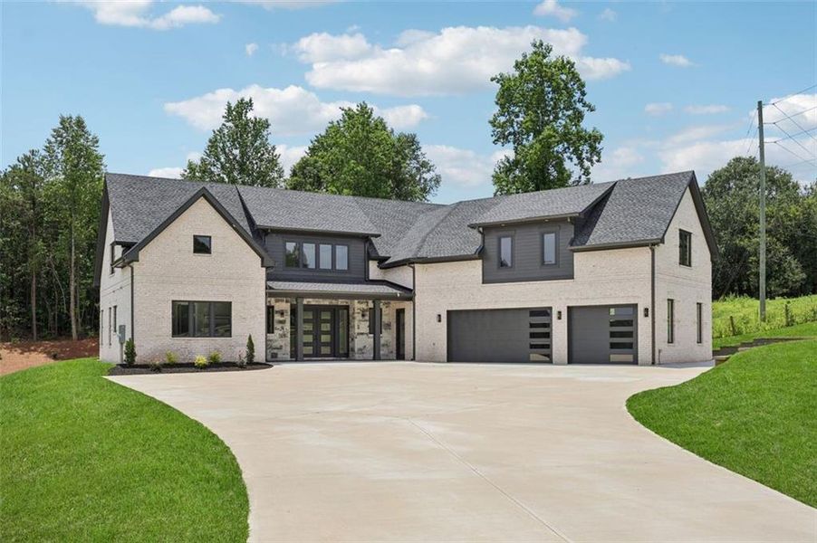 Front exterior of a new home in , Braselton, GA, highlighting curb appeal (Image 2). Front exterior of a new home in , Braselton, GA, highlighting curb appeal (Image 2).