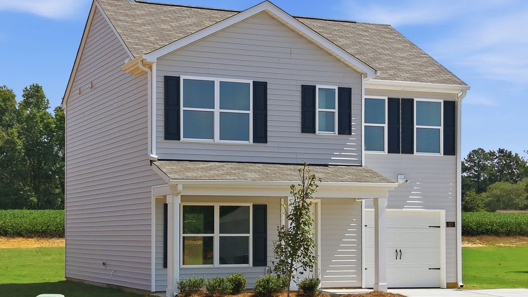 Front exterior of a new home in Hobbs Farm, Ayden, NC, highlighting curb appeal (Image 17).