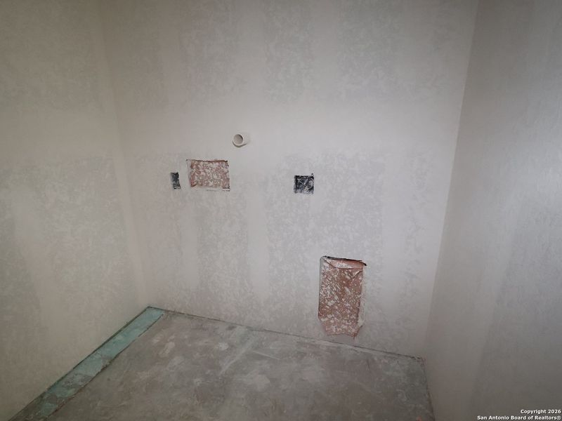 In-progress construction of a new home in Greenspoint Heights, Seguin, TX (Image 33).