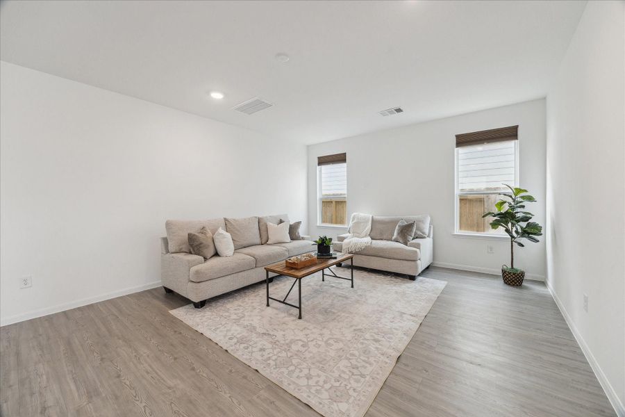 Furnished interior view inside a new home in Decker Farms, Magnolia (Image 9).