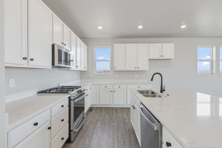 Furnished interior view inside a new home in The Aurora Highlands, Aurora (Image 7).