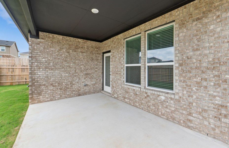 Exterior details and patio area of a home in Sunfield, Buda (Image 3). Exterior details and patio area of a home in Sunfield, Buda (Image 3).