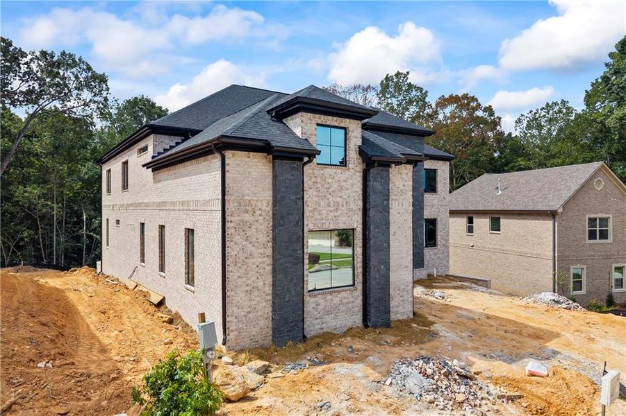 Front exterior of a new home in , Fairburn, GA, highlighting curb appeal (Image 20).