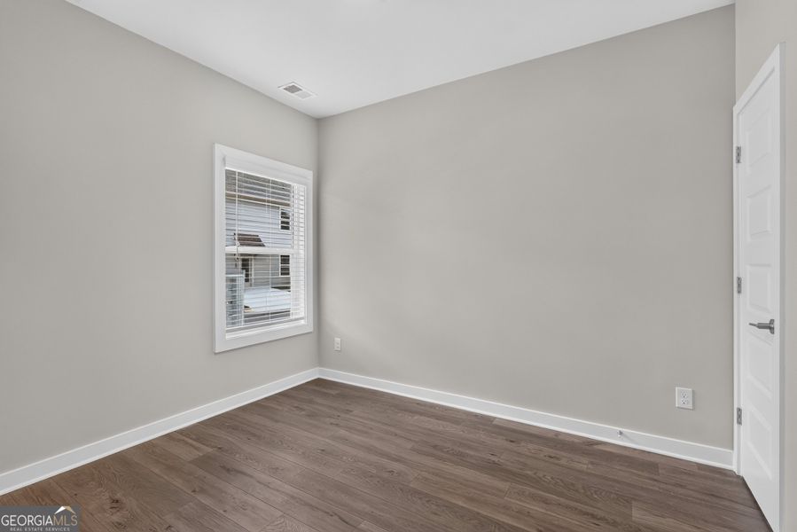 Spacious, unfurnished interior of a new home in The Cottages at East Lanier, Fayetteville (Image 15).