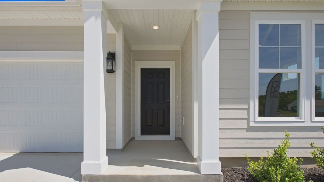 Welcoming covered front entryway Welcoming covered front entryway