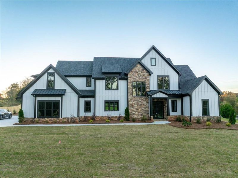 Front exterior of a new home in , Cumming, GA, highlighting curb appeal (Image 25). Front exterior of a new home in , Cumming, GA, highlighting curb appeal (Image 25).