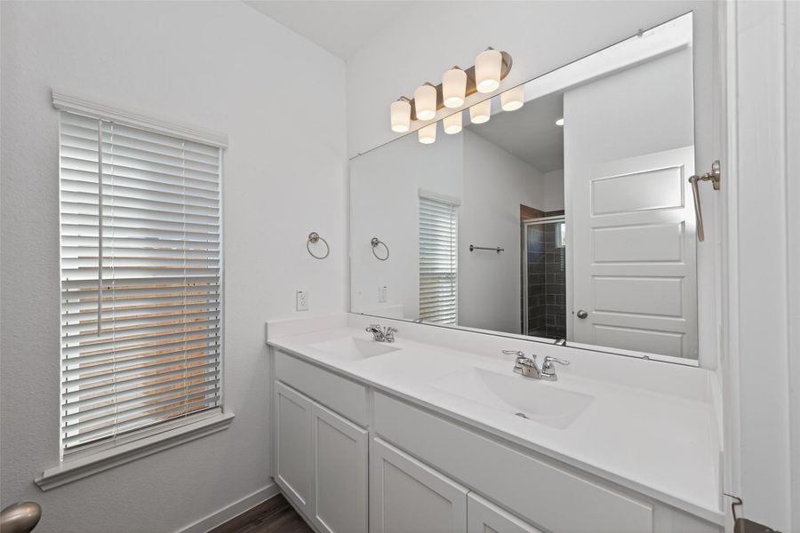 Furnished interior view inside a new home in Enclave at Willis, Willis (Image 9).