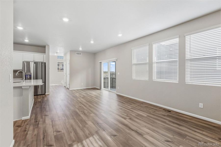 Spacious, unfurnished interior of a new home in Woodrose at Painted Prairie, Aurora (Image 15).