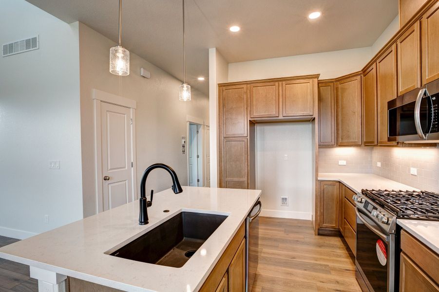 Representative furnished interior of a home built from the The Addison by Landmark Homes in The Lakes at Centerra, Loveland (Image 8). Representative furnished interior of a home built from the The Addison by Landmark Homes in The Lakes at Centerra, Loveland (Image 8).