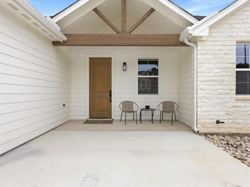 This cathedral styled front porch makes all feel welcome.