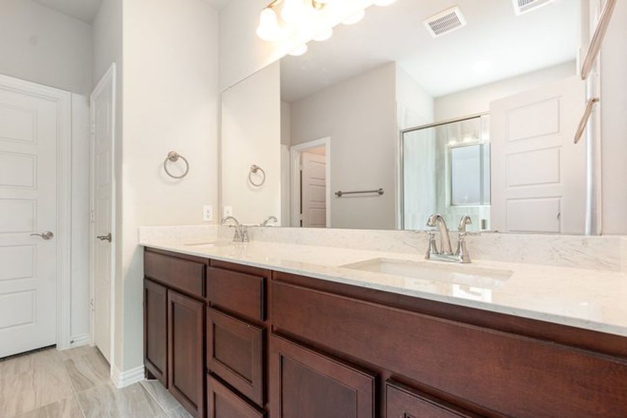 Furnished interior view inside a new home in Courts Of Bonnie Brae, Denton (Image 9).