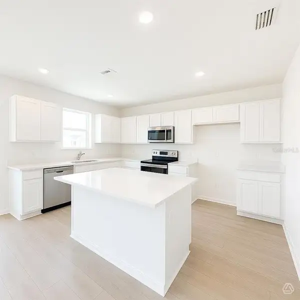 Furnished interior view inside a new home in , Parrish (Image 4).