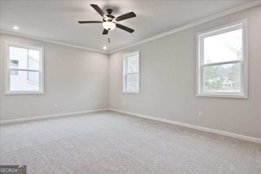 Spacious, unfurnished interior of a new home in The Paddocks at Doc Hughes, Buford (Image 31).