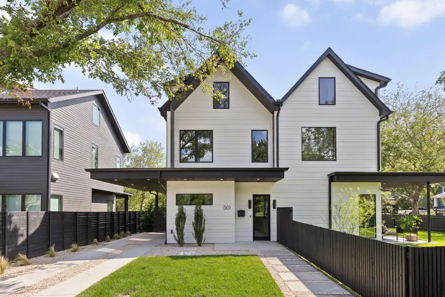 View of front of property with a fenced front yard
