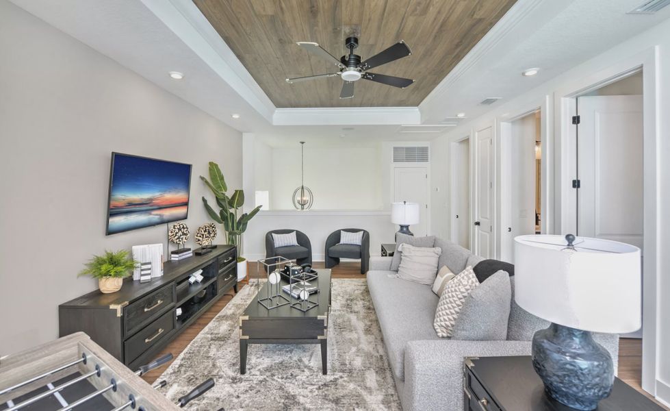 Furnished interior in a model home at Laureate Park in Orlando (Image 9).