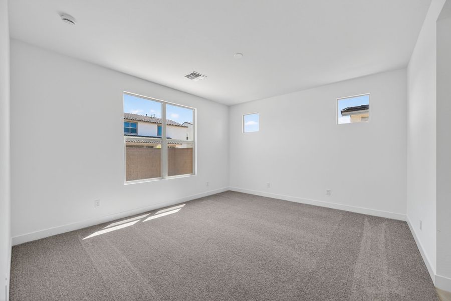 Spacious, unfurnished interior of a new home in Artisan at Asante, Surprise (Image 16).