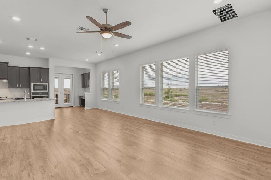Spacious, unfurnished interior of a new home in The Grove at Blackhawk, Pflugerville (Image 6).