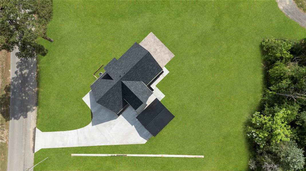 Front exterior of a new home in , Mineola, TX, highlighting curb appeal (Image 24).