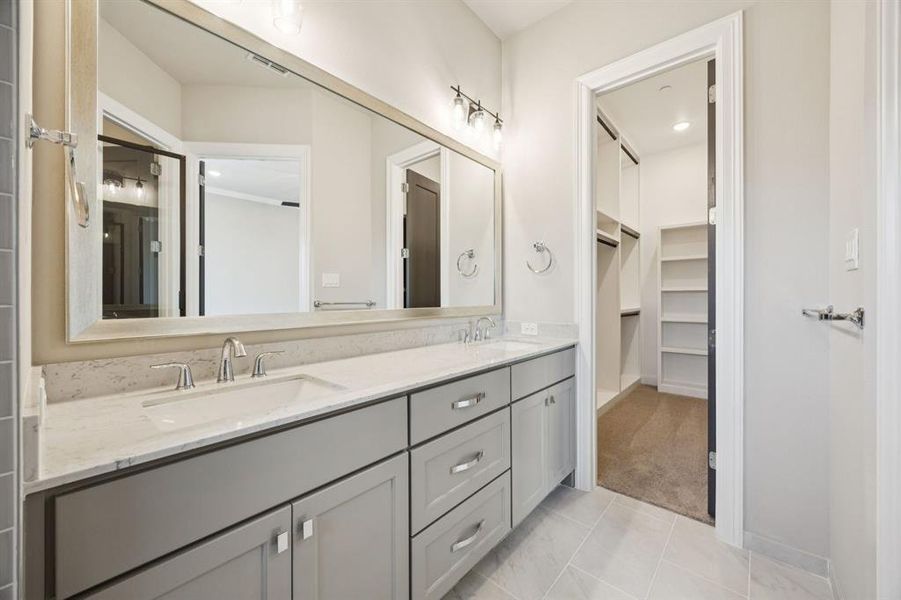 Dual sinks in primary bathroom.