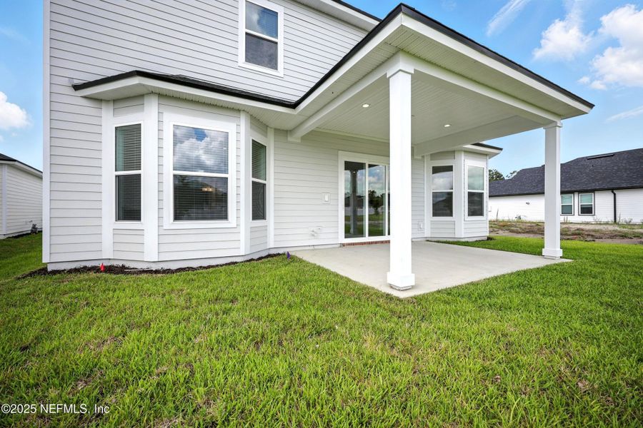 Front exterior of a new home in Silver Landing At Silverleaf, St. Augustine, FL, highlighting curb appeal (Image 2).