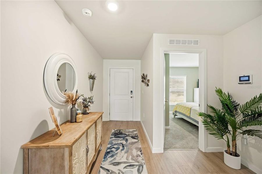 Furnished interior view inside a new home in Central Parc, North Port (Image 10).