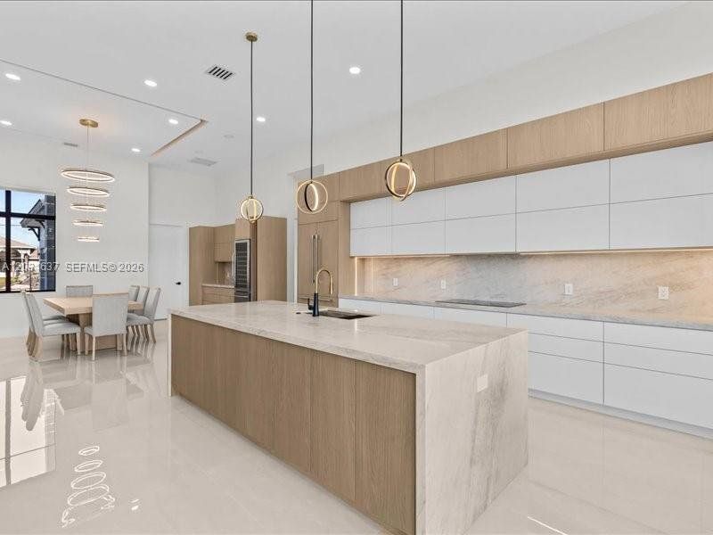 Furnished interior view inside a new home in , Port St. Lucie (Image 14).