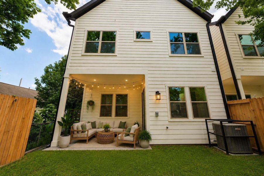 Exterior details and patio area of a home in , Houston (Image 3).