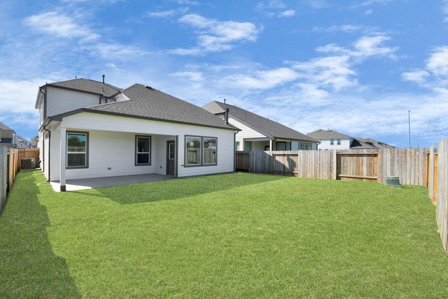 Come and see this spacious backyard with its beautiful covered patio. There is plenty of room for the kids to play and adults to relax. Perfect for your outdoor living space, patio furniture, bbq pit, and so much more. The possibilities are endless! Come and see this spacious backyard with its beautiful covered patio. There is plenty of room for the kids to play and adults to relax. Perfect for your outdoor living space, patio furniture, bbq pit, and so much more. The possibilities are endless!