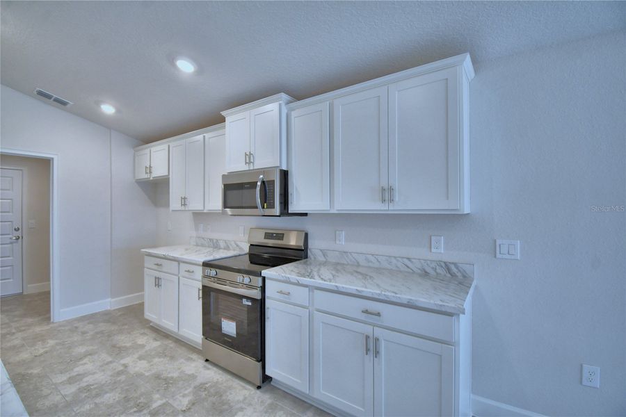 Furnished interior view inside a new home in Cadence Crossing, Auburndale (Image 6).